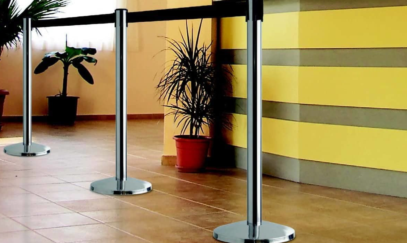 retraceable belt barriers